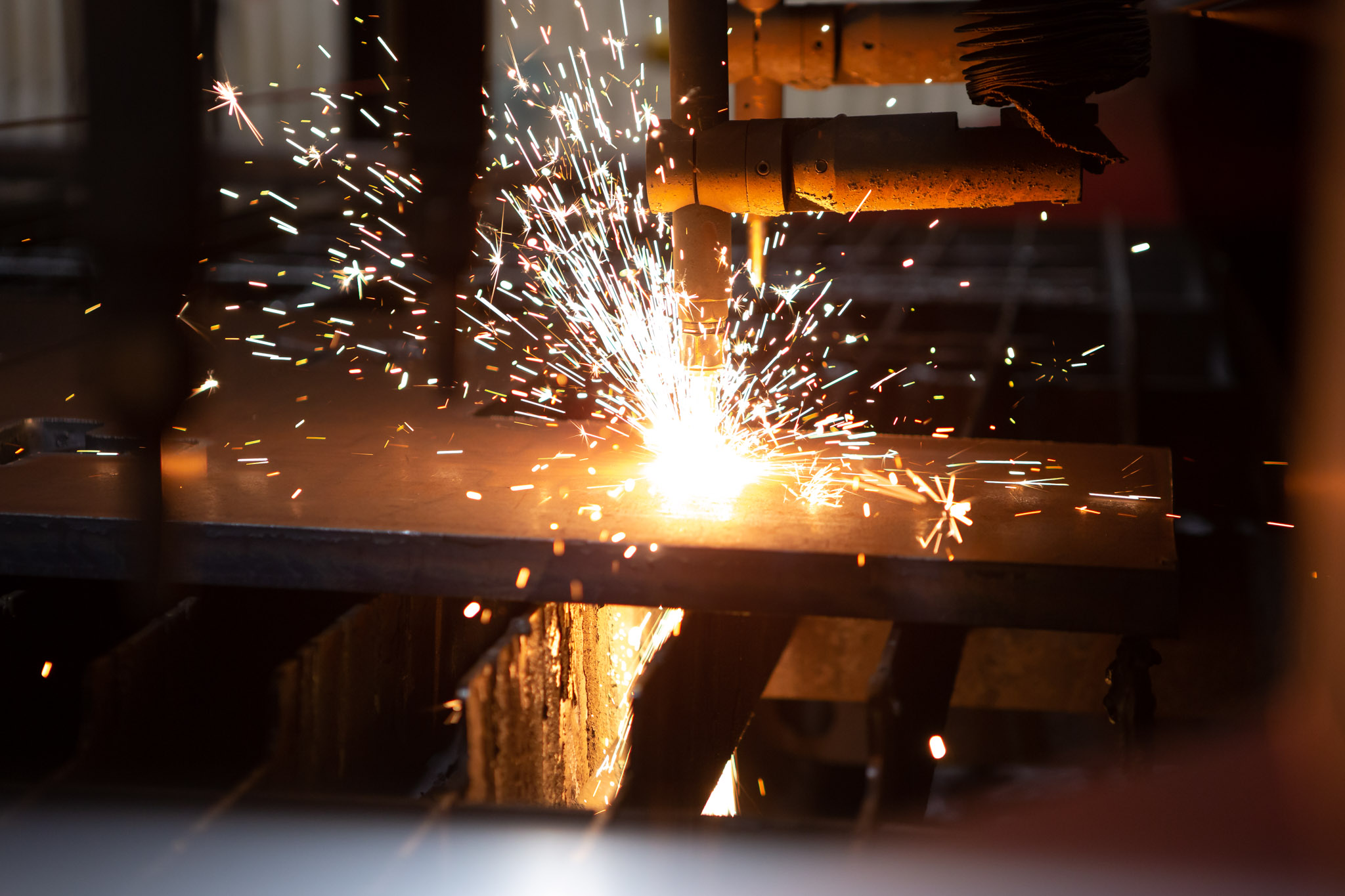 sparks flying during profiling steel plate